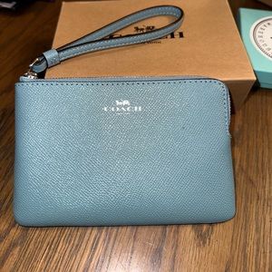 Blue coach wristlet, brand new and unused